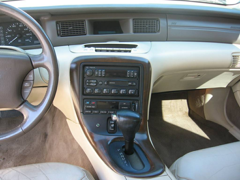 Illustration for article titled For $25,000, Would You Like To Wake Up Next To This 1998 Lincoln Mark VIII “Sleeper?“